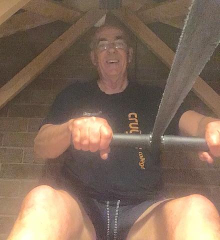 Paul Nash in his loft completing the challenge